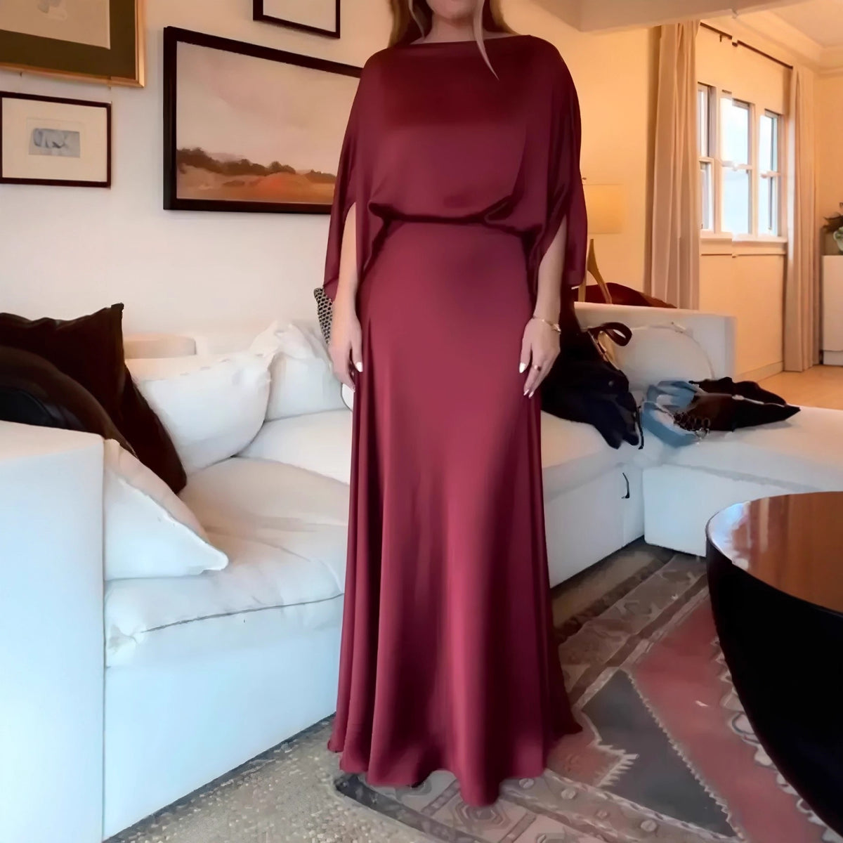A Sleek Solid-color Satin Dress With Smooth Lines